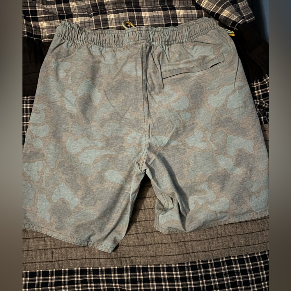 Marsh wearing shorts and Medium size navy colored.